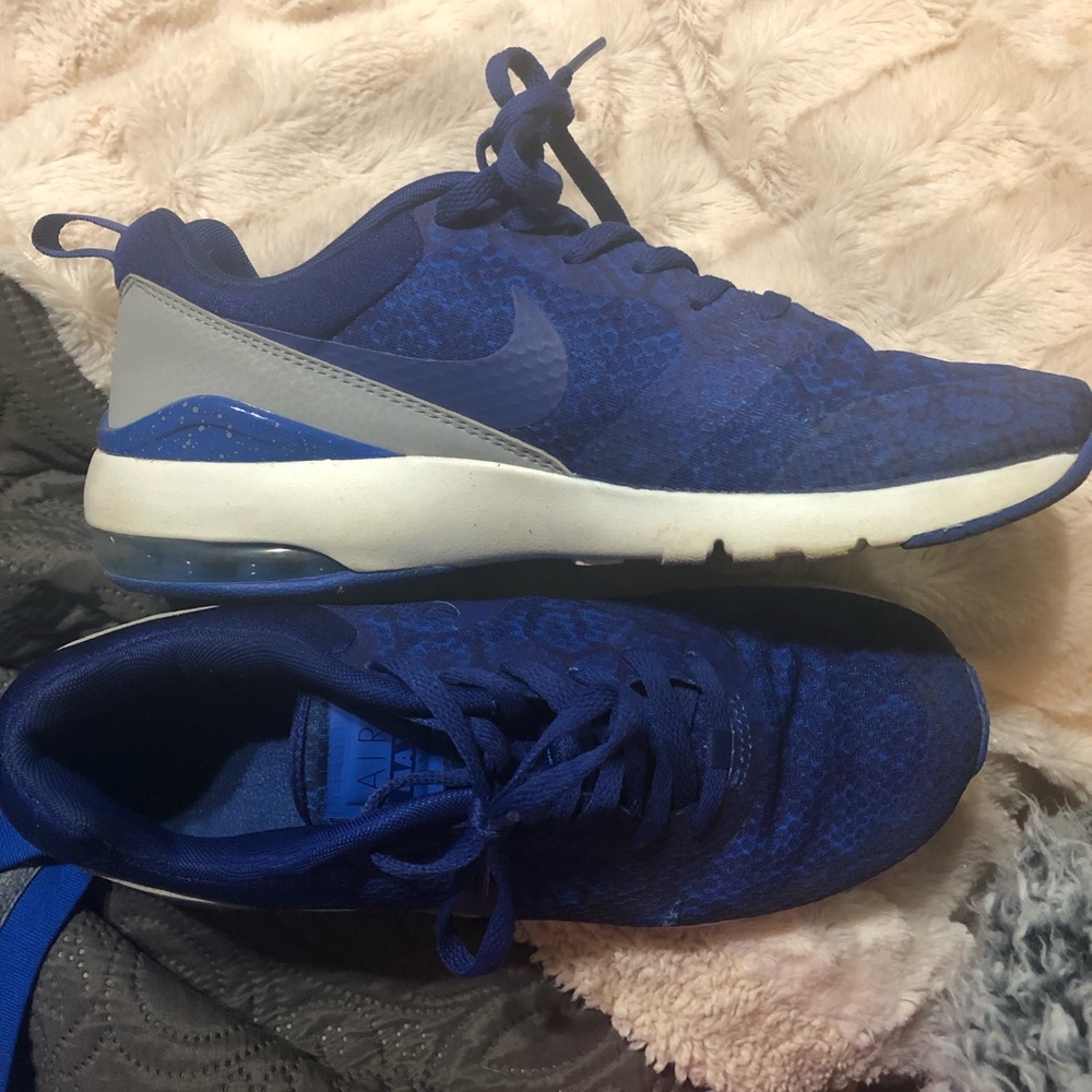 Blue Nike tennis shoes